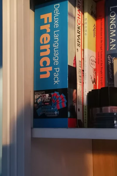 French language books arranged on a bookshelf