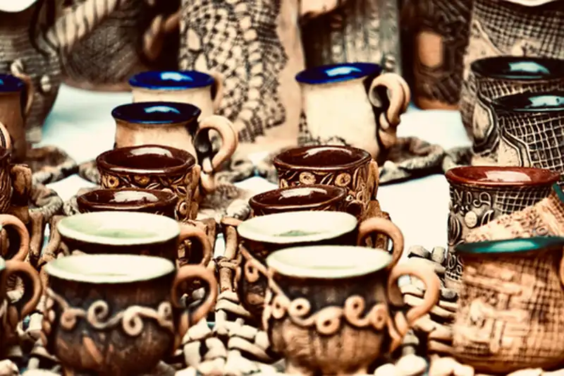 Handmade ceramic mugs in earthy tones